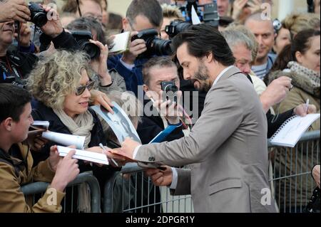 Keanu Reeves posiert vor der nach ihm benannten Strandhütte als Teil einer Hommage an sein Lebenswerk auf der Promenade des Planches während des 41. Deauville American Film Festival in Deauville, Frankreich am 4. September 2015. Foto von Alban Wyters/ABACAPRESS.COM Stockfoto