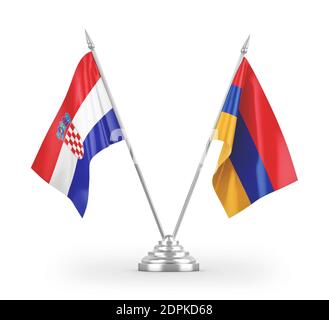 Armenische und kroatische Tischflaggen isoliert auf weißem 3D-Rendering Stockfoto