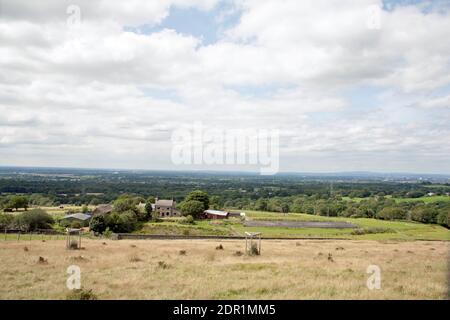 Wolke vorbei über die Cheshire Plain Park Moor Lyme Handley Lyme Park Cheshire England Stockfoto