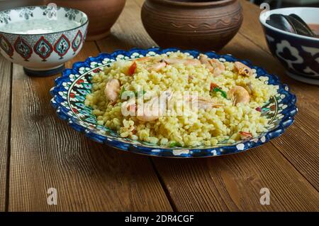 Bulgur di Pesce - Italienischer Bulgur mit Venusmuscheln Stockfoto