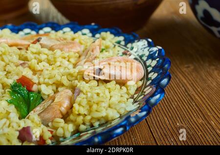 Bulgur di Pesce - Italienischer Bulgur mit Venusmuscheln Stockfoto