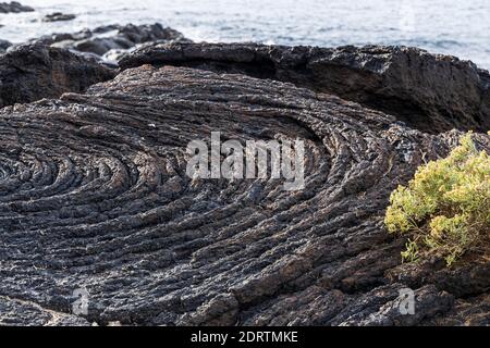 Pahoehoe, ropige Lava, vulkanische Felsformationen an der Westküste, Playa San Juan, Teneriffa, Kanarische Inseln, Spanien Stockfoto