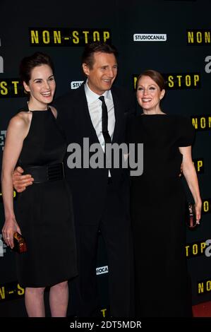 Julianne Moore, Michelle Dockery und Liam Neeson bei der französischen Premiere des Films "NON STOP" im Gaumont Opera Cinema in Paris, Frankreich am 27 2014. Januar. Foto von Nicolas Genin/ABACAPRESS.COM Stockfoto