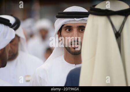 Dubais Herrschersohn Sheikh Hamdan bin Mohammed Al Maktoum nimmt am 29. März 2014 an der Dubai World Cup Teil, dem "reichsten Pferderennen der Welt" auf der Meydan Rennbahn in der Nähe von Dubai, Vereinigte Arabische Emirate. Foto von Ammar Abd Rabbo/ABACAPRESS.COM Stockfoto