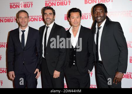 Medi Sadoun, Ary Abittan, Frederic Chau und Noom Diawara nehmen an der Premiere von 'Qu'est-ce qu'on a fait au Bon Dieu' Teil, die am 10. April 2014 im Le Grand Rex in Paris, Frankreich, stattfand. Foto von Nicolas Briquet/ABACAPRESS.COM Stockfoto