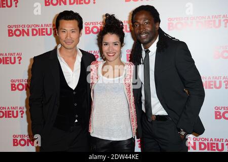 Frederic Chau, Sabrina Ouazani und Noom Diawara nahmen an der Premiere von 'Qu'est-ce qu'on a fait au Bon Dieu' Teil, die am 10. April 2014 im Le Grand Rex in Paris, Frankreich, stattfand. Foto von Nicolas Briquet/ABACAPRESS.COM Stockfoto