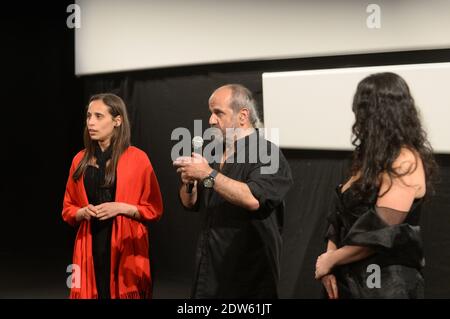 L-R : Regisseure Wiam Simav Bedirxan, Ossama Mohammed und Noma Omran vor der Vorführung ihres Films 'Silvered Water, Syria Self-Portrait', am dritten Tag der 67. Filmfestspiele in Cannes, Frankreich am 16. Mai 2014. Wiam Simav Bedirxan kam gerade aus Homs in Syrien an und war von der öffentlichen Reaktion und dem Applaus bewegt, sie und ihren Film zu empfangen. Foto von Ammar Abd Rabbo//ABACAPRESS.COM Stockfoto