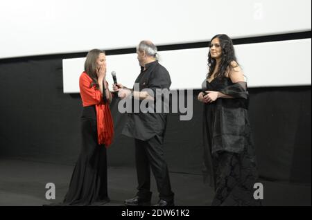 L-R : Regisseure Wiam Simav Bedirxan, Ossama Mohammed und Noma Omran vor der Vorführung ihres Films 'Silvered Water, Syria Self-Portrait', am dritten Tag der 67. Filmfestspiele in Cannes, Frankreich am 16. Mai 2014. Wiam Simav Bedirxan kam gerade aus Homs in Syrien an und war von der öffentlichen Reaktion und dem Applaus bewegt, sie und ihren Film zu empfangen. Foto von Ammar Abd Rabbo//ABACAPRESS.COM Stockfoto