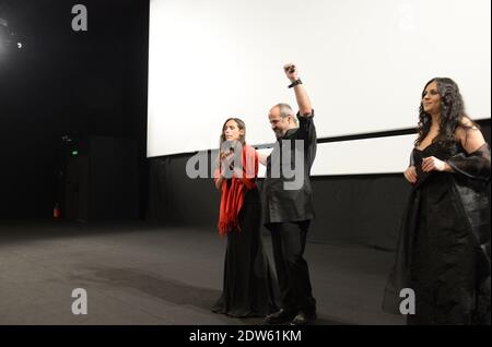 L-R : Regisseure Wiam Simav Bedirxan, Ossama Mohammed und Noma Omran vor der Vorführung ihres Films 'Silvered Water, Syria Self-Portrait', am dritten Tag der 67. Filmfestspiele in Cannes, Frankreich am 16. Mai 2014. Wiam Simav Bedirxan kam gerade aus Homs in Syrien an und war von der öffentlichen Reaktion und dem Applaus bewegt, sie und ihren Film zu empfangen. Foto von Ammar Abd Rabbo//ABACAPRESS.COM Stockfoto