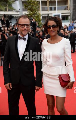 Pierre-Francois Martin-Laval und seine Frau, die am 17. Mai 2014 im Palais des Festivals in Cannes, Frankreich, im Rahmen der 67. Filmfestspiele von Cannes bei der Vorführung von Saint-Laurent eintrafen. Foto von Nicolas Briquet/ABACAPRESS.COM Stockfoto