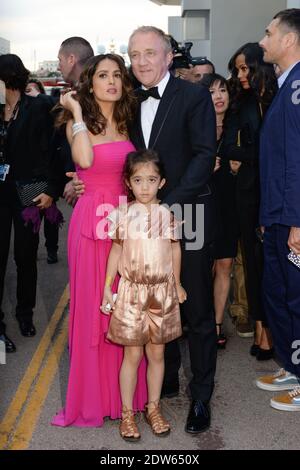 Salma Hayek, Ehemann Francois-Henri Pinault und Tochter Valentina nach der ersten Vorführung von "der Prophet" am vierten Tag der 67. Filmfestspiele in Cannes, Frankreich am 17. Mai 2014. Foto von Ammar Abd Rabbo//ABACAPRESS.COM Stockfoto