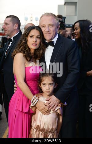 Salma Hayek, Ehemann Francois-Henri Pinault und Tochter Valentina nach der ersten Vorführung von "der Prophet" am vierten Tag der 67. Filmfestspiele in Cannes, Frankreich am 17. Mai 2014. Foto von Ammar Abd Rabbo//ABACAPRESS.COM Stockfoto