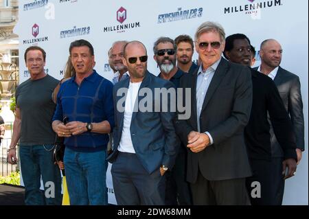 Die Darsteller, darunter Regisseur Patrick Hughes, Sylvester Stallone, Jason Statham, Harrison Ford, Wesley Snipes, Dolph Lundgren, Glen Powell, Randy Couture, Antonio Banderas, Arnold Schwarzenegger, Kellan Lutz und Natalie Burn, die bei der Fotoausstellung des Films Expendables 3 im Rahmen der 67. Internationalen Filmfestspiele Cannes in Cannes ankommen, Südfrankreich am 18. Mai 2014. Foto von Nicolas Genin/ABACAPRESS.COM Stockfoto