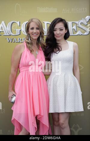 Keely Hawkes und Jane Zhang bei der Fotoschau für den Film Dragon Nest, der am 18. Mai 2014 im Plage Royale im Rahmen des 67. Filmfestivals von Cannes in Cannes, Frankreich, stattfand. Foto von Jerome Domine/ABACAPRESS.COM Stockfoto