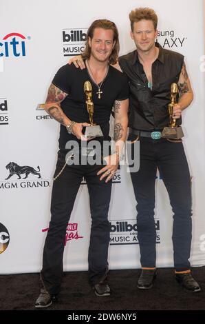 Die Mitglieder der Florida Georgia Line Tyler Hubbard (L) und Brian Kelley waren am 18. Mai 2014 im Presseraum der Billboard Music Awards 2014 in der MGM Grand Garden Arena in Las Vegas, NV, USA. Foto von Kobby Dagan/ABACAPRESS.COM Stockfoto