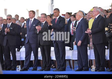 L-R : König Philippe von Belgien, König Willem Alexander von den Niederlanden, Bronislaw Komorowski, Präsident der Republik Polen, Präsident der Vereinigten Staaten von Amerika, Barack Obama, italienischer Präsident Giorgio Napolitano, Präsident der Slowakischen Republik, Ivan Gasparovic an der internationalen Zeremonie am Sword Beach in Ouistreham, Im Rahmen der offiziellen Feierlichkeiten anlässlich des 70. Jahrestages des D-Day am 6. Juni 2014 in der Normandie, Frankreich. Foto von Abd Rabbo-Bernard-Gouhier-Mousse/ABACAPRESS.COM Stockfoto