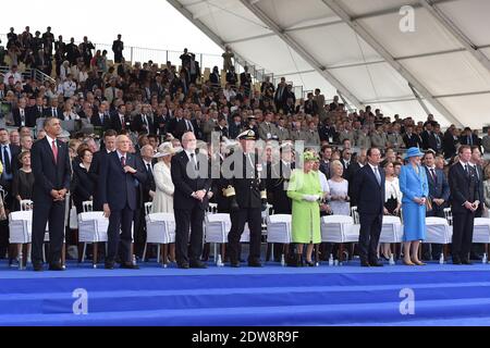 Barack Obama, Präsident der Vereinigten Staaten von Amerika ; Giorgio Napolitano, Präsident von Italien ; Ivan Gasparovic, Präsident der Slowakischen Republik ; HM der König von Norwegen, Harald V ; HM die britische Königin Elizabeth II ; Francois Hollande, Präsident von Frankreich ; HM die Königin von Dänemark, Margrethe II. ; H.H. der Großherzog von Luxemburg, Henri, nimmt an der internationalen Zeremonie am Sword Beach in Ouistreham Teil, als Teil der offiziellen Zeremonien anlässlich des D-Day 70. Jahrestag, am 6. Juni 2014 in der Normandie, Frankreich. Foto von Abd Rabbo-Bernard-Gouhier-Mousse/ABACAPRESS.COM Stockfoto