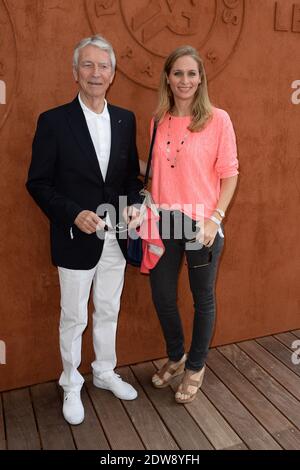 Jean-Claude Narcy und Laure Brovelli halten im Village, dem VIP-Viertel der French Tennis Open 2014 in der Roland Garros Arena in Paris, Frankreich, am 7. Juni 2014, Foto von Laurent Zabulon/ABACAPRESS.COM Stockfoto