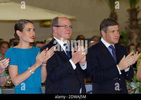 Prinz Albert II. Von Monaco und seine Nichte Charlotte Casiraghi applaudieren bei der Teilnahme an der Ausgabe 2014 des Springpferdewettbewerbs Jumping International von Monaco im Rahmen der Global Champions Tour am 28. Juni 2014 in Monaco. Foto Thierry Orban/ABACAPRESS.COM Stockfoto
