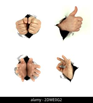 Männliche Hände zeigen Gesten auf weißem Hintergrund. Zerrissenes Papier und Handbewegung Stockfoto