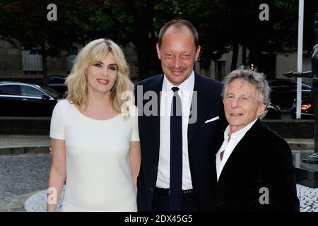 Emmanuelle Seigner, Stefano Cantino und Roman Polanski bei der Ankunft für die Miu Miu Resort Collection Präsentation im Conseil Economique et Social in Paris, Frankreich am 05. Juli 2014. Foto von Aurore Marechal/ABACAPRESS.COM Stockfoto