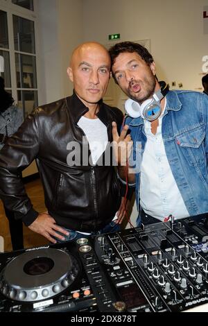 Datei Foto - Hubert Blanc-Francard und Philippe Cerboneschi Zdar (Cassius) bei der Levi's Party in Paris, Frankreich, am 10. September 2014. Philippe Cerboneschi (auch bekannt als "Zdar"), eine Hälfte des französischen Tanzduos Cassius, ist am Mittwoch zufällig in Paris gestorben, teilte sein Agent mit. "Er fiel zufällig durch das Fenster eines hohen Stockwerks eines Pariser Gebäudes", sagte Sebastien Farran, ohne weitere Details zu nennen. Cerboneschi gründete Cassius 1996 mit Hubert Blanc-Francard (alias Boombass). Sie produzierten für Bands wie Phoenix, Beastie Boys, Franz Ferdinand und French Hip ho Stockfoto