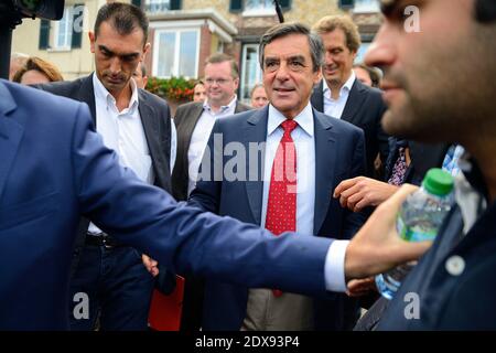 Francois Fillon, ehemaliger Premierminister und Mitglied eines Triumvirats, der die französische rechte UMP-Partei anführt, wird am 21. September 2014 bei einem Grillfest mit Militanten in Domont bei Paris, Frankreich, gesehen. Foto von Nicolas Briquet/ABACAPRESS.COM Stockfoto