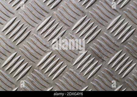 Eine Diamantplatte, auch bekannt als Checker Plate, Trittplatte, Cross Hatch Kick Plate und Durbar Bodenplatte, breite Schuss im Querformat Ausrichtung. Stockfoto