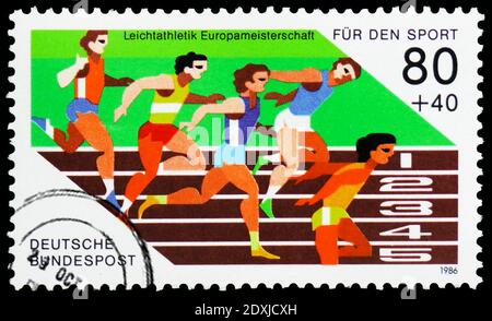 MOSKAU, RUSSLAND - 23. MÄRZ 2019: Briefmarke gedruckt in Deutschland, Bundesrepublik zeigt Laufen, Sporthilfe Serie, um 1986 Stockfoto