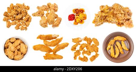 Sammlung von verschiedenen frittierten Hähnchenstücke (Nuggets, Streifen, Flügel, etc.) isoliert auf weißem Hintergrund Stockfoto