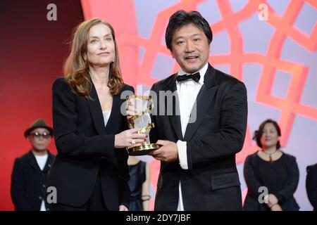 Isabelle Huppert und Hirokazu Kore-eda beim Tribute to Japanese Cinema während des 14. Marrakech Film Festival in Marrakesch, Marokko am 9. Dezember 2014. Foto von Nicolas Briquet/ABACAPRESS.COM Stockfoto