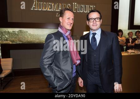 Michael Schumacher spricht mit Audemars Piguet CEO François-Henry Bennahmias auf dem Audemars Piguet Stand während der Internationalen Uhrmachermesse SIHH 2013, die am 22. Januar 2013 in der Palexpo in Genf, Schweiz, stattfand. Foto von Loona/ABACAPRESS.COM Stockfoto