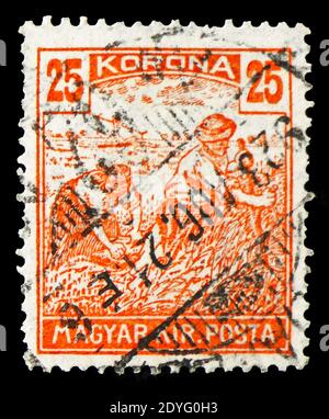 MOSKAU, RUSSLAND - 19. JULI 2019: Briefmarke gedruckt in Ungarn zeigt Reaper, Serie, um 1923 Stockfoto