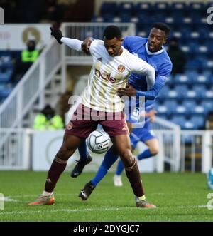 Hartlepool, Großbritannien. Dezember 2020. Nial Bell (#39 FC Halifax Town) wird von Timi Odusina (#5 Hartlepool United) während des National League Spiels zwischen Hartlepool United und FC Halifax Town im Victoria Park in Hartlepool unter Druck gesetzt.Quelle: SPP Sport Press Photo. /Alamy Live Nachrichten Stockfoto