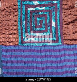 Textil-Hintergrund - handgefertigte Detail von Patchwork-Stoff mit Spirale Muster Stockfoto