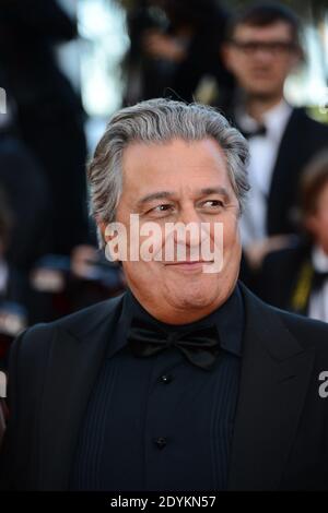Christian Clavier und seine Frau kommen zur Filmvorführung von Immigranten, die am 24. Mai 2013 im Palais des Festivals in Cannes, Frankreich, im Rahmen der 66. Filmfestspiele von Cannes stattfand. Foto von Nicolas Briquet/ABACAPRESS.COM Stockfoto