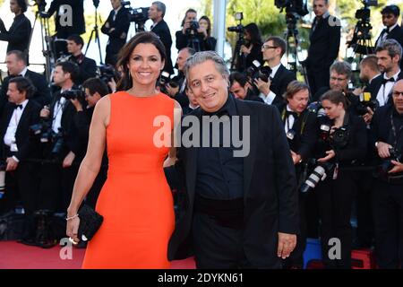 Christian Clavier und seine Frau kommen zur Filmvorführung von Immigranten, die am 24. Mai 2013 im Palais des Festivals in Cannes, Frankreich, im Rahmen der 66. Filmfestspiele von Cannes stattfand. Foto von Nicolas Briquet/ABACAPRESS.COM Stockfoto