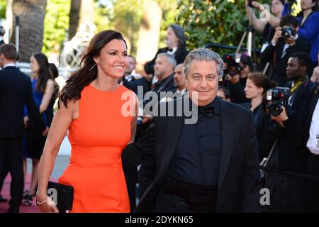 Christian Clavier und seine Frau kommen zur Filmvorführung von Immigranten, die am 24. Mai 2013 im Palais des Festivals in Cannes, Frankreich, im Rahmen der 66. Filmfestspiele von Cannes stattfand. Foto von Nicolas Briquet/ABACAPRESS.COM Stockfoto