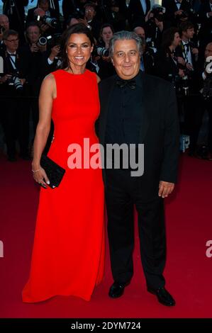 Christian Clavier und seine Frau kommen zur Filmvorführung "The Immigrant", die am 24. Mai 2013 im Palais des Festivals in Cannes, Frankreich, im Rahmen der 66. Filmfestspiele von Cannes stattfand. Foto von Nicolas Genin/ABACAPRESS.COM Stockfoto