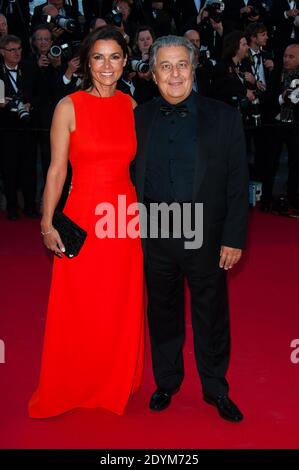 Christian Clavier und seine Frau kommen zur Filmvorführung "The Immigrant", die am 24. Mai 2013 im Palais des Festivals in Cannes, Frankreich, im Rahmen der 66. Filmfestspiele von Cannes stattfand. Foto von Nicolas Genin/ABACAPRESS.COM Stockfoto