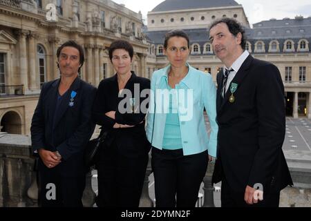 Yvan Attal, Christine Angot, Aurelie Filippetti und Francois Morel posieren nach der Ehrenzeremonie des französischen Kultusministeriums im Ministere de la Culture in Paris, Frankreich am 19. Juni 2013. Foto von Alban Wyters/ABACAPRESS.COM Stockfoto