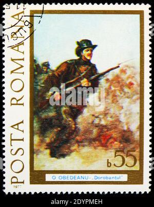 MOSKAU, RUSSLAND - 19. AUGUST 2019: Briefmarke gedruckt in Rumänien zeigt angreifenden Infantryman, von Obedenau, Hundertjahrfeier der Unabhängigkeitsserie, um 19 Stockfoto