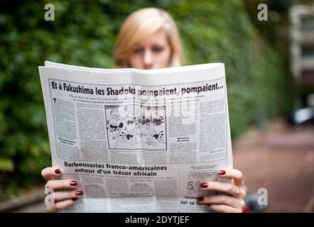 Die französische Satirezeitung 'Le Canard Enchaine' veröffentlichte am 11. September 2013 einen Cartoon über den Atomunfall von Fukushima in Paris. Foto von Thierry Orban/ABACAPRESS.COM Stockfoto