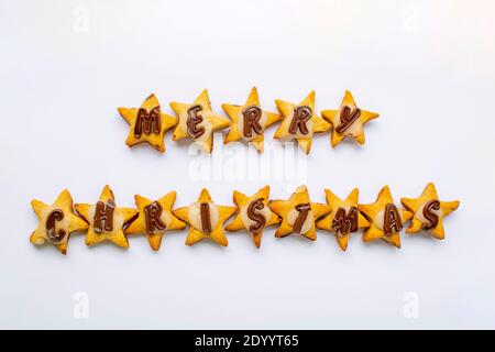 Frohe Weihnachten Lebkuchenstern Kekse mit Schokolade und Glasur Stockfoto