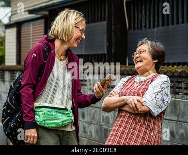 Culture Clash gelöst in Übersetzung, Nishiizu-Cho, Japan Stockfoto