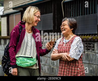 Culture Clash gelöst in Übersetzung, Nishiizu-Cho, Japan Stockfoto