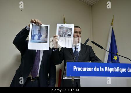 Der französische Staatsanwalt Francois Molins und der Direktor der Pariser Justizpolizei Christian Flaesch bei einer Pressekonferenz, auf der ein Bild des Schützen gezeigt wird, der in der Lobby des französischen Zeitungsbüros Liberation das Feuer eröffnete, Er verletzte einen Assistenten des Fotografen ernsthaft und eröffnete das Feuer vor dem Vorstadthauptsitz der Societe Generale im Geschäftsviertel La Defense, bevor er am 18. November 2013 ein Auto entnahm, um ihn zur Champs-Elysees Avenue zu bringen, heute in Paris, Frankreich. Foto von Mousse/ABACAPRESS.COM Stockfoto