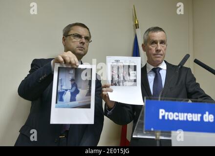 Der französische Staatsanwalt Francois Molins und der Direktor der Pariser Justizpolizei Christian Flaesch bei einer Pressekonferenz, auf der ein Bild des Schützen gezeigt wird, der in der Lobby des französischen Zeitungsbüros Liberation das Feuer eröffnete, Er verletzte einen Assistenten des Fotografen ernsthaft und eröffnete das Feuer vor dem Vorstadthauptsitz der Societe Generale im Geschäftsviertel La Defense, bevor er am 18. November 2013 ein Auto entnahm, um ihn zur Champs-Elysees Avenue zu bringen, heute in Paris, Frankreich. Foto von Mousse/ABACAPRESS.COM Stockfoto