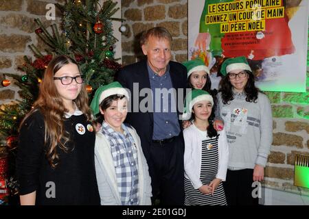 Patrick Poivre d'Arvor, der am 02. Dezember 2013 am Sitz des Vereins in Paris, Frankreich, an der Einführung der Kampagne "Les Peres Noel Verts" von Le Secours Populaire teilnahm. Foto von Alban Wyters/ABACAPRESS.COM Stockfoto