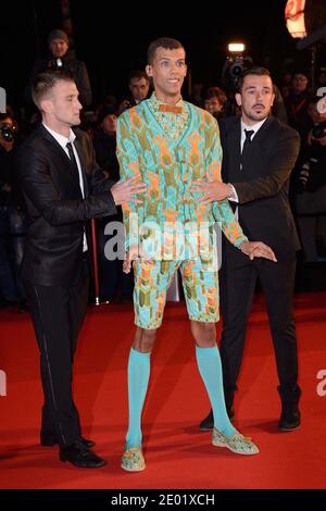 Stromae Teilnahme an den 15. NRJ Music Awards, die am 14. Dezember 2013 im Palais des Festivals in Cannes, Frankreich, stattfinden. Foto von Nicolas Briquet/ABACAPRESS.COM Stockfoto